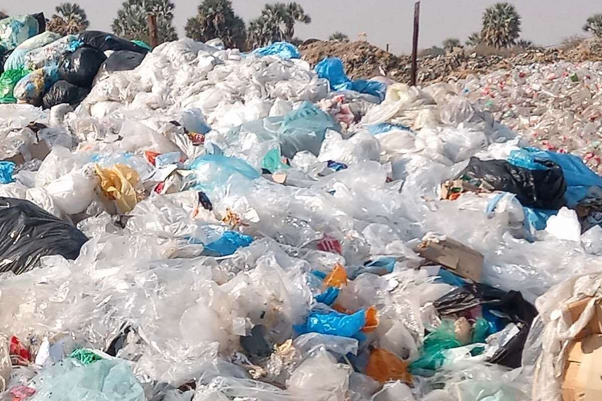 A huge mountain of plastic fills this local tip.