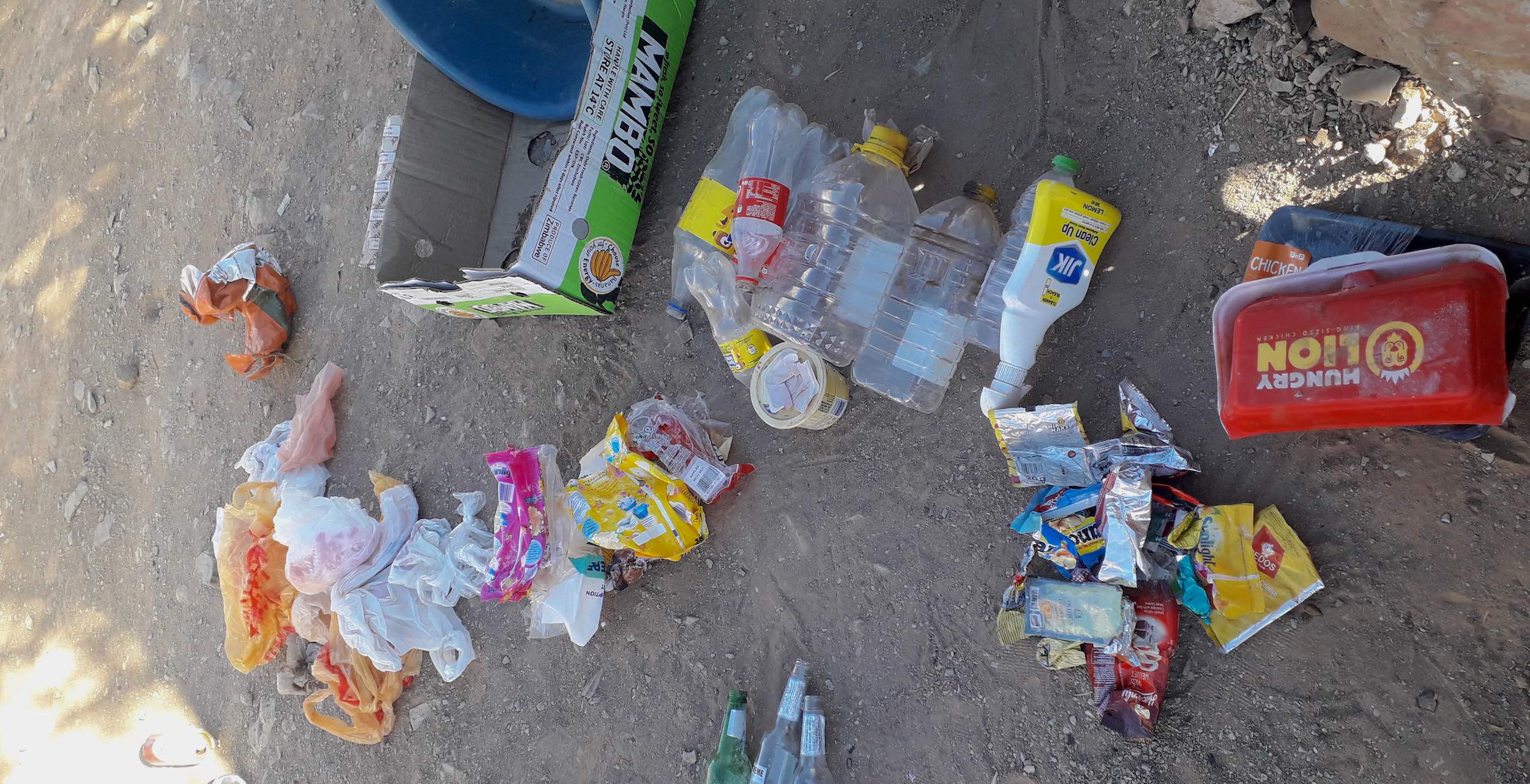 Household waste divided up into separate piles.