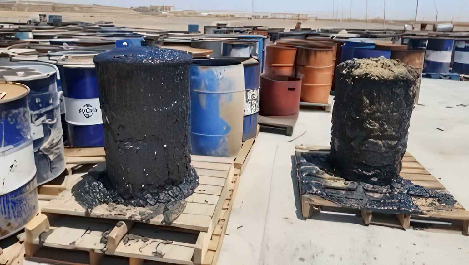 Leaking drums of industrial waste.