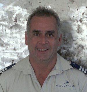 Portrait photograph of Conrad Brain.