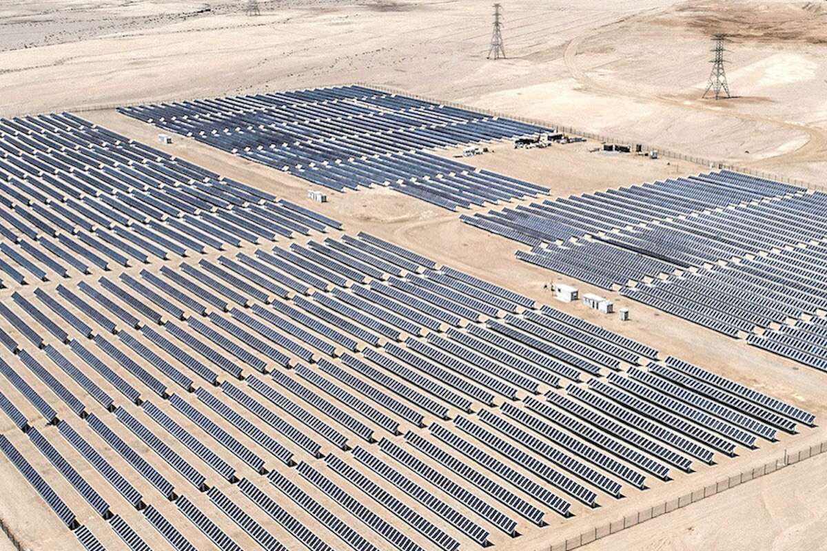A vast solar farm in the desert.